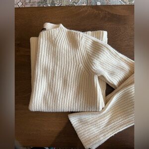 The Row Cream Turtleneck Sweater